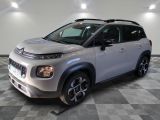 La nouvelle Citroën est garée dans le garage d'un immeuble