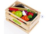 a wooden crate filled with assorted fruits and vegetables