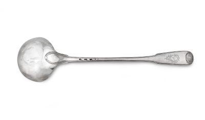 a spoon with a spoon handle on a white surface