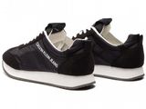 a picture of a pair of black sneakers with white soles