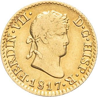 a close up of a gold coin with a man ' s head on it