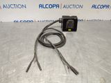 a picture of an electrical device with wires attached to it