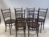 six chairs are lined up in a row on a white background