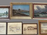 many paintings hanging on the wall next to each other
