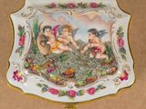 a plate with a picture of two cherensils on it