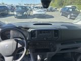 dashboard view of a car with a lot of cars in the background