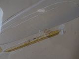a picture of a plastic container with a plastic object inside of it