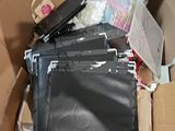 a cardboard box with a bunch of items inside of it