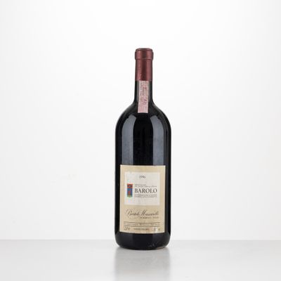a bottle of red wine sitting on top of a table