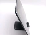 a close up picture of a tablet computer on a stand