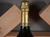 a bottle of wine that is sitting on a table