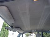 the interior of a car with the sunroof down and the sunroof down
