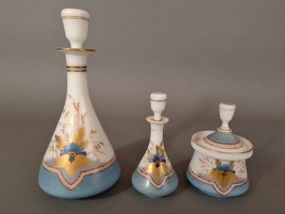 three vases that are sitting on a table