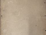 a picture of a piece of brown paper with holes in it