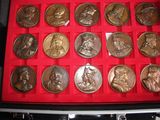 a red box filled with silver and gold medals