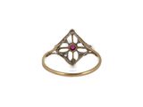 an image of a gold ring with a ruby stone in the center