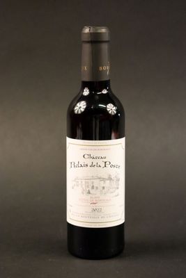 a bottle of wine that is sitting on a table