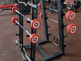 a lot of gym equipment that are on the floor