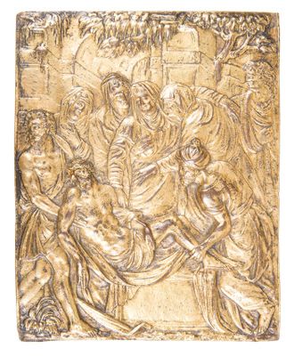 une plaque en or représentant la Nativité de Jésus et de Marie