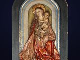 an image of a statue of a woman holding a child