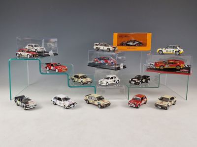 a lot of cars that are on display in a display case