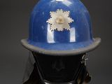an image of a blue helmet with a star on the top of it