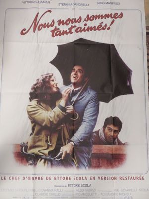 affiche de film représentant un homme et une femme sous un parapluie sous la pluie