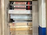 a box full of books sitting on the floor