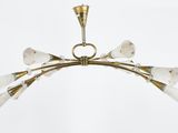 a close up of a chandelier with six white flowers on it