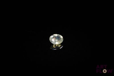 a diamond in the dark with a black background