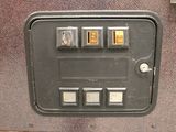 a close up of a machine that has four buttons on it