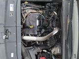 a car that has a engine in the back of it