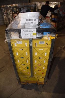 a large yellow box with a package on top of it