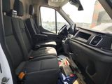 the interior of a van with black leather seats and black trims