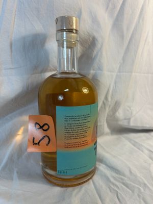 a bottle of alcohol that is sitting on a table