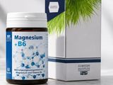 une photo d'un flacon de magnésium et de vitamine B6 à côté d'une boîte