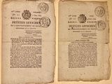 deux feuilles de papier ancien, sur lesquelles figurent des timbres, posées l'une à côté de l'autre