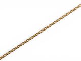 a close up of a gold chain on a white background