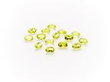 a bunch of yellow sapphires on a white background
