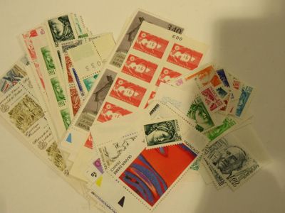 many different types of stamps on the table