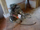 a machine that is sitting on the floor in a room