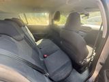 the back seats of a car are empty in the sun