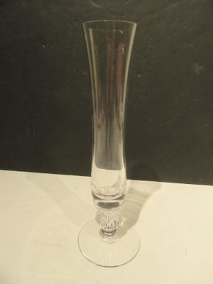a glass vase that is sitting on a table