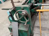 a machine that is working on a machine that is in a factory