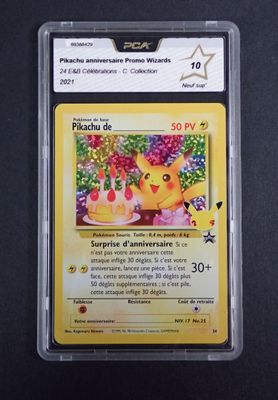 the pokemon card is in a plastic holder on a table