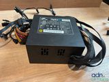 a close up of a computer power supply on a table