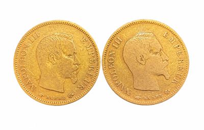 une pièce d'or représentant le profil d'un homme et la tête d'une femme