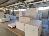 a large warehouse filled with lots of white boxes