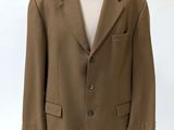 an image of a suit on a mannequin stand