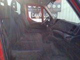a car that is sitting in the back seat of a truck